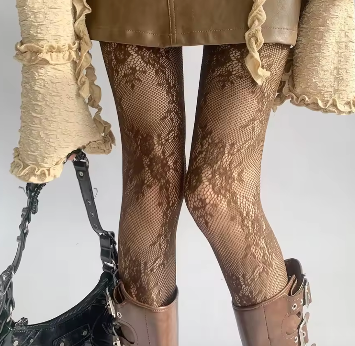 Collants en dentelle avec effet floral