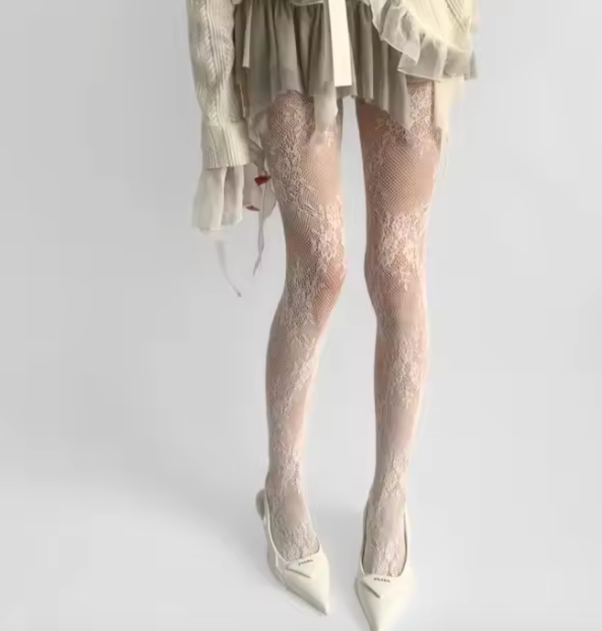 Collants en dentelle avec effet floral