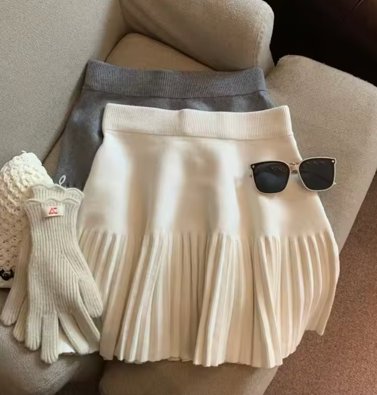 Jupe courte en maille plissée