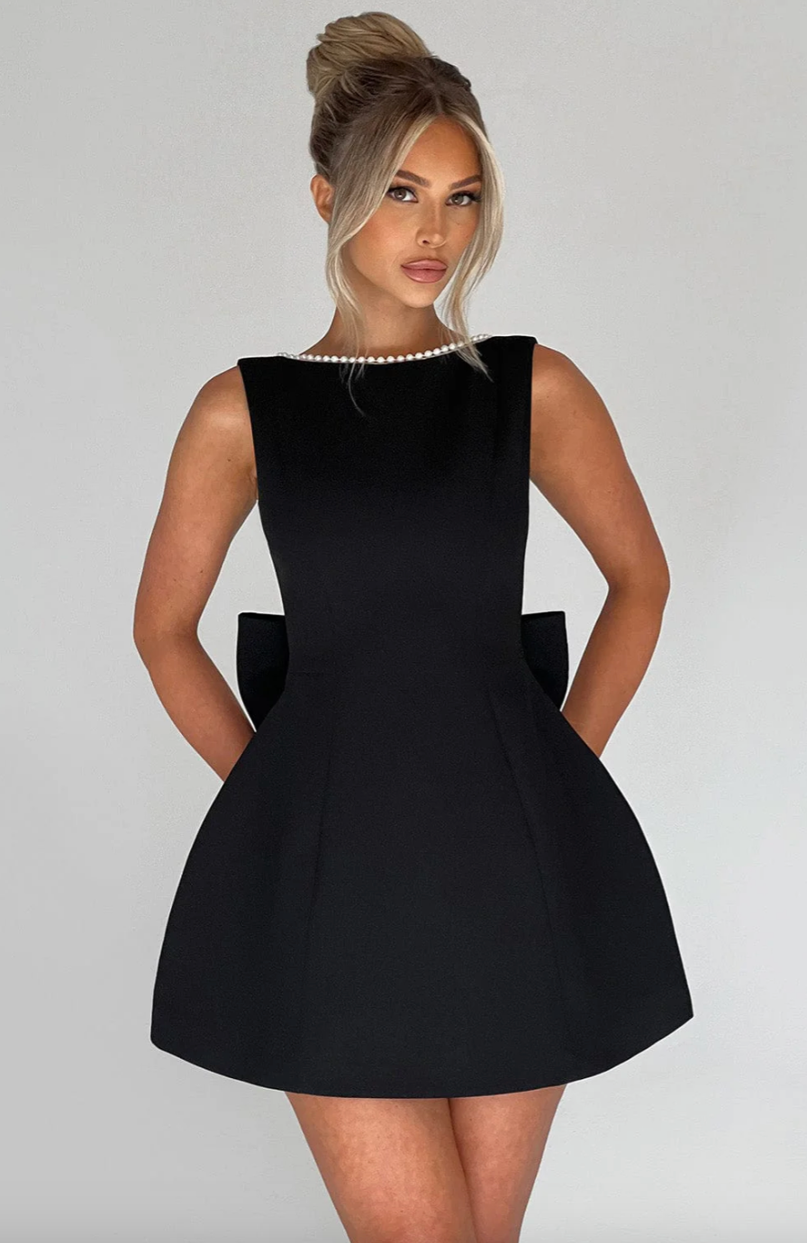 Mini robe avec gros lacet au dos